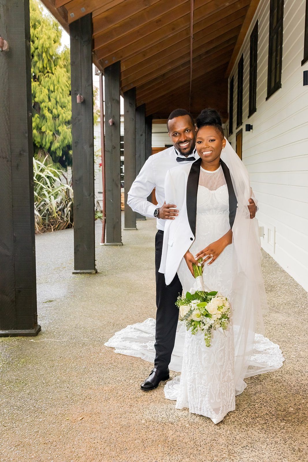 Couple sharing a joyful moment at their Wellington wedding